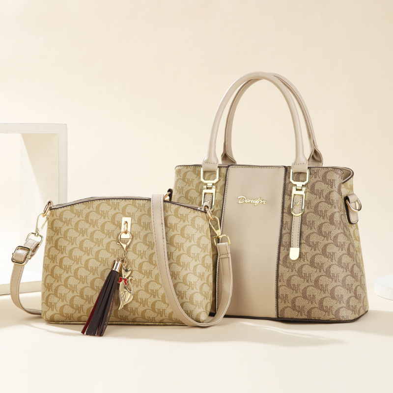Dos piezas de paquete de bolsos de moda versátil bolsos de mano de la atmósfera simple bolsos de hombro de damas bolsos cross-border
