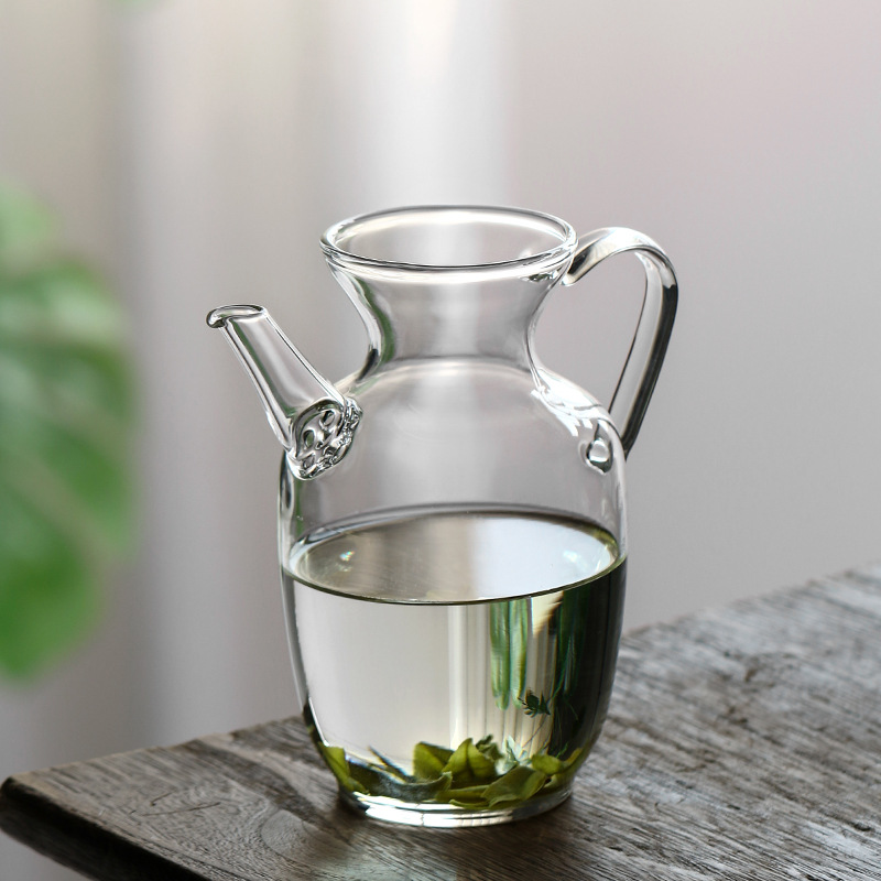 작은 녹색 오렌지 찻주전자