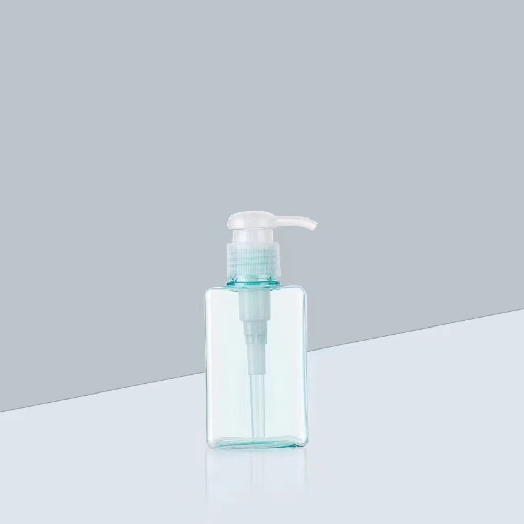 Chai phẳng trong suốt màu xanh 100ml