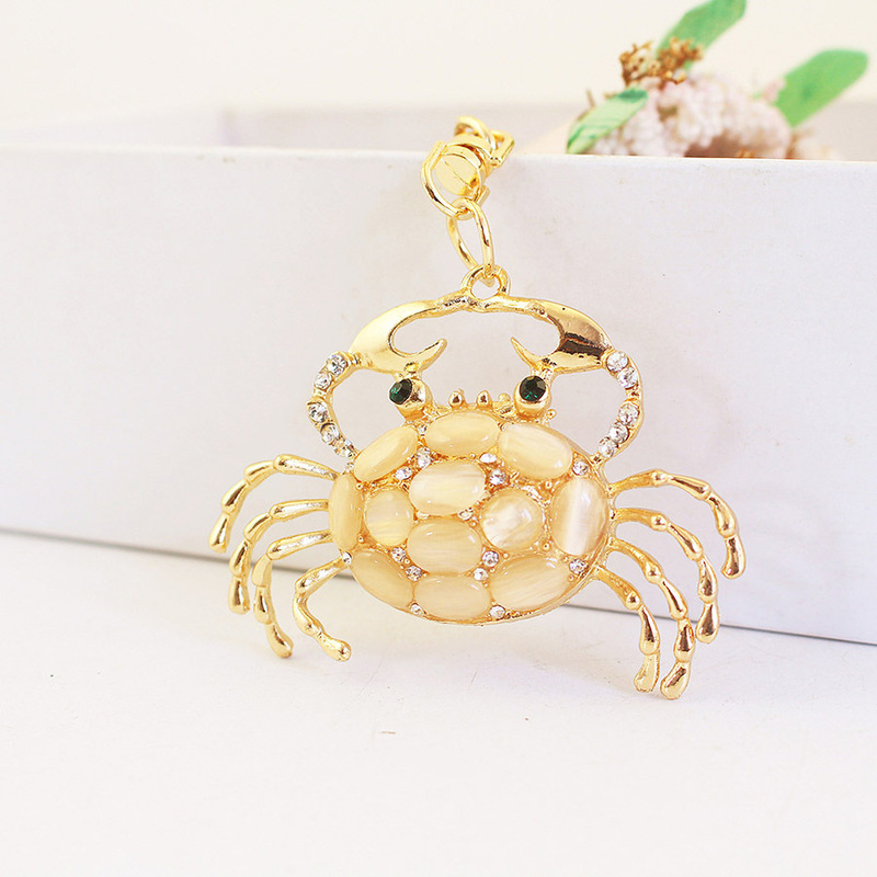 Creative cute cat's eye stone crab car key chain lady bag hairy crab pendant key chain wholesale 925