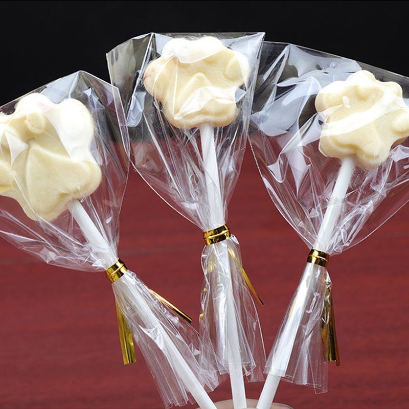 Bolsa de embalaje Lollipop de tres piezas de papel, bolsas de filamento, pasteles, barras de queso ecológicas, dulces, barras pequeñas, grado alimenticio
