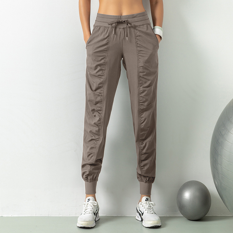 Pantalones de chándal sueltos transpirables, pantalones de fitness de yoga de entrenamiento para correr delgado para mujer, pantalones casuales de bolsillo de nueve puntos