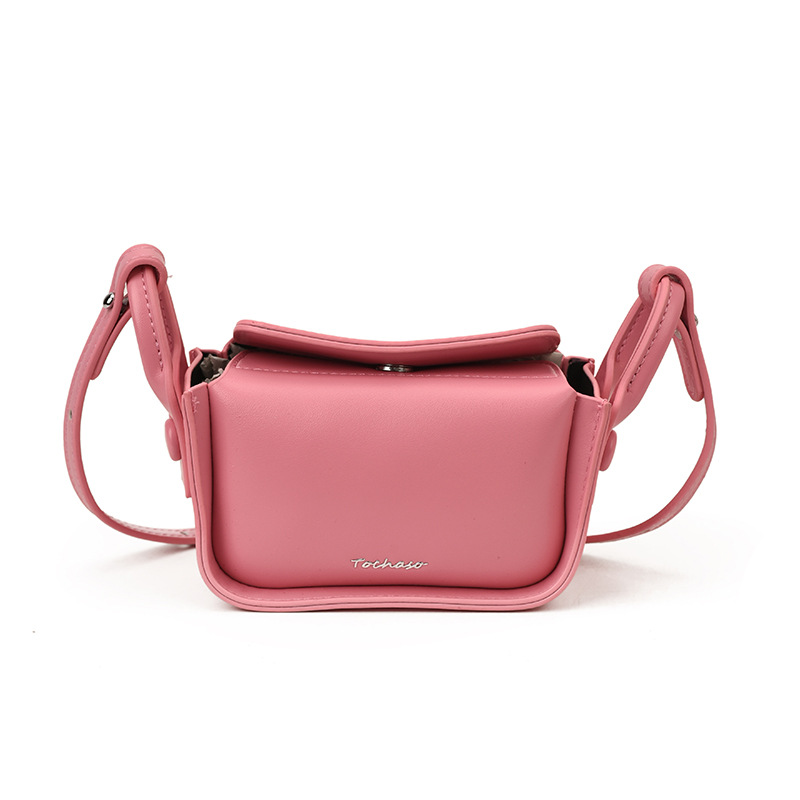 Bolsa de hombro coreana para niños y niñas simple color sólido mini bolso de hombro para niñas letras extranjeras para niños bolso pequeño