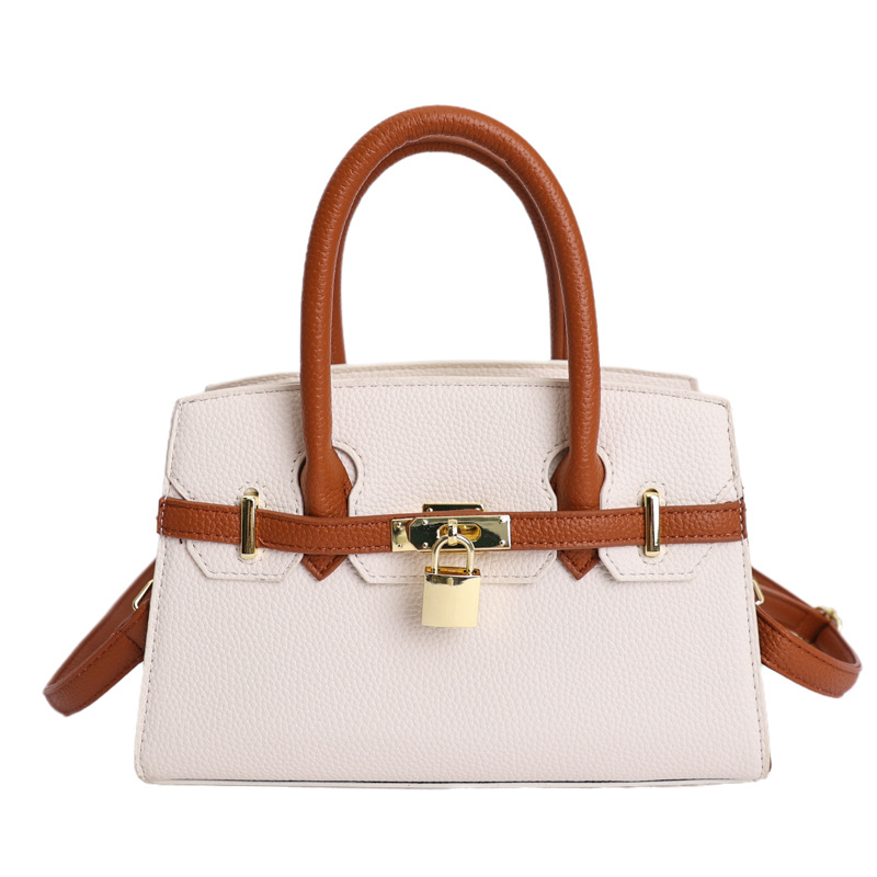 Coreano simple bolso de mano mujer 2026 primavera nueva bolsa de viaje diario texturizada bolso de mochila