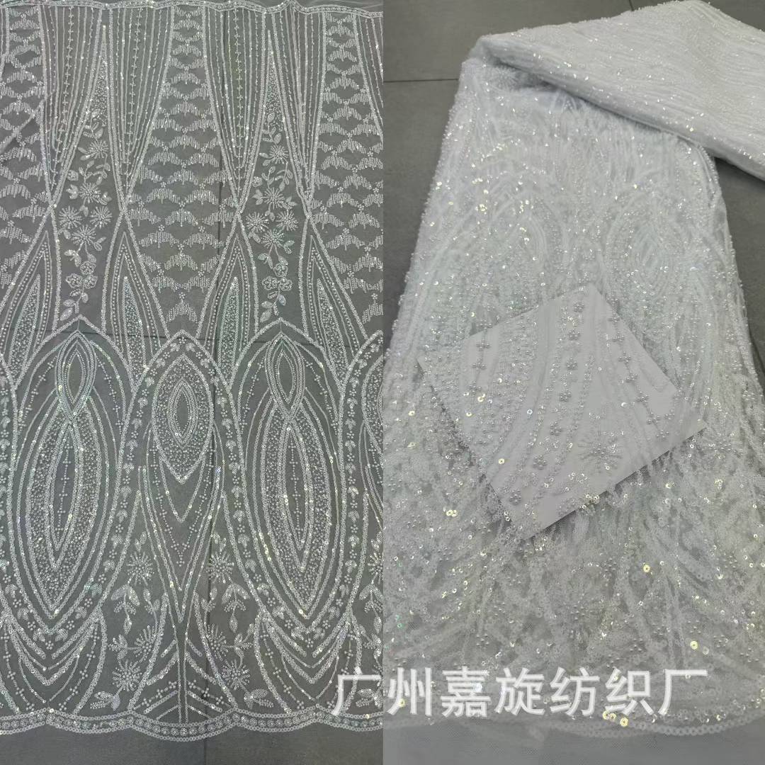 Nuevo cristal blanqueado sequinilla gran máquina bordada tela de encaje vestido de boda europea y americana tela de banquete