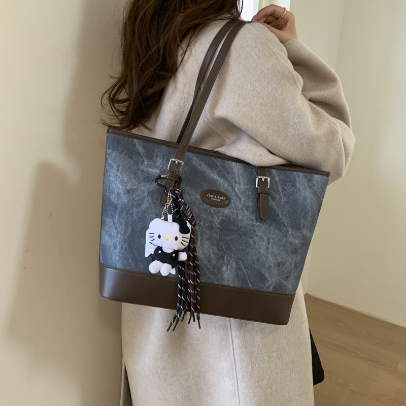 2025 invierno nuevo retro nicho Volkswagen bolso de mano de gran capacidad bolso de hombro de viaje de mujer bolso de brazo de moda versátil bolso de brazo
