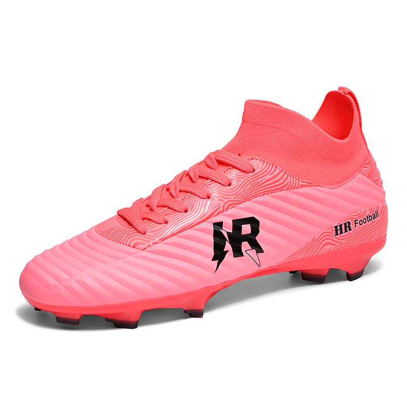 2025 nuevo comercio exterior hombre y mujer clavos largos zapatos de entrenamiento de clavos zapatos juveniles de escuela secundaria fábrica de zapatos de fútbol