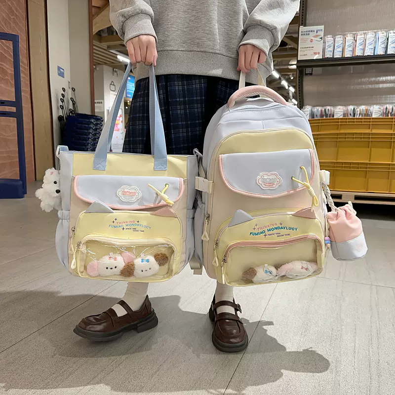 批发小众初中生书包高颜值学院风少女双肩包牛津布可爱卡通娃包女