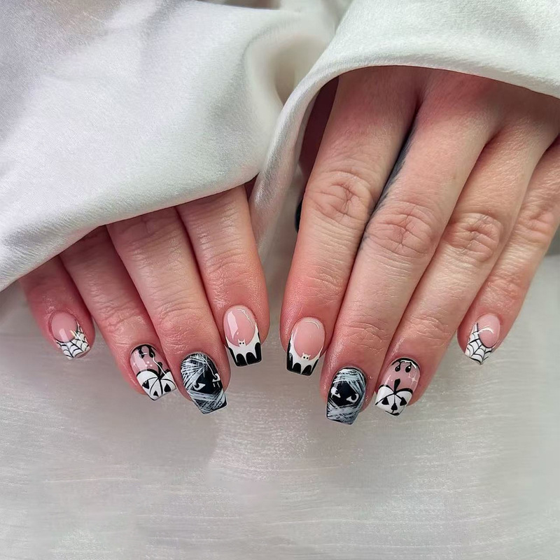 Black and white French spider web, bat, mummy, pumpkin design short square Halloween press-on nails