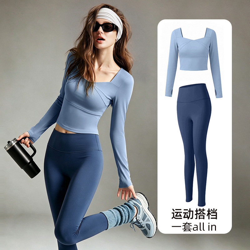 Trendy color-block yoga outfit for women, featuring a slim-fit, figure-flattering, stretchy long-sleeved top and high-waisted, form-fitting leggings, perfect for autumn