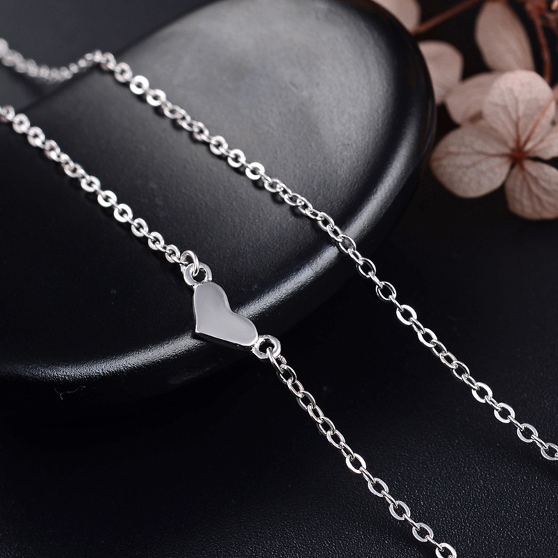 La moda transfronteriza con diamantes huecos colgante en forma de corazón s925 collar de clavícula de plata coreano dulce pequeño collar de fragancia nuevo producto