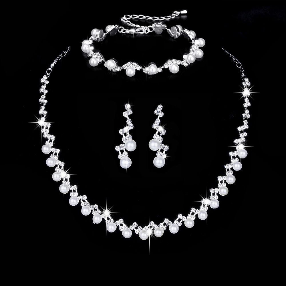 Moda Geométrico Cobre Embutido Perlas Artificiales Circón Mujeres Pulsera Aretes Collar display picture 1