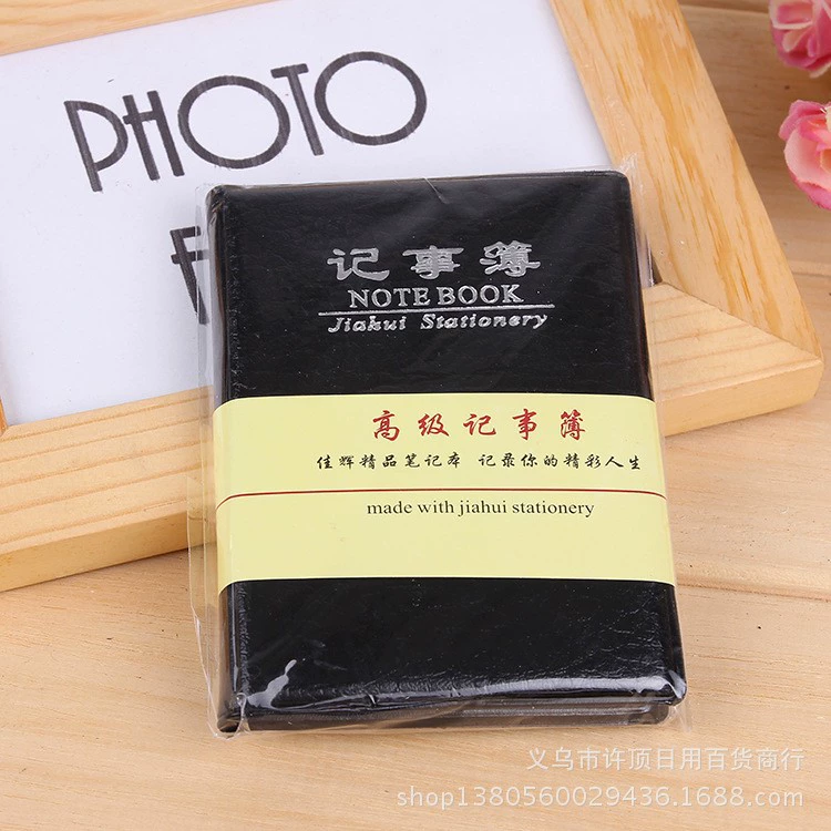 Small pocket telephone, handheld laptop, book, notebook