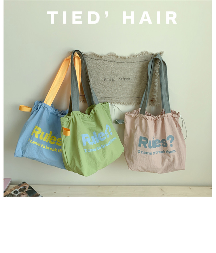 Fashionable and simple letter print large-capacity tote bag 2025 new style contrasting color versatile drawstring pleated single-shoulder bag Application Scenario