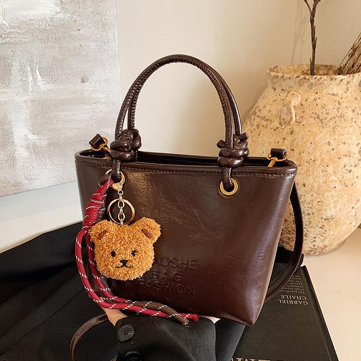 Bolsos de balde casuales retro de mano para mujeres otoño y invierno 2024 nueva moda moda bolso de hombro de alta calidad bolso de nicho de mujer