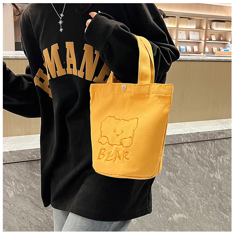 Personalized ladies' bucket bag, versatile and cute canvas bear wholesale, simple Japanese style new handbag undefined