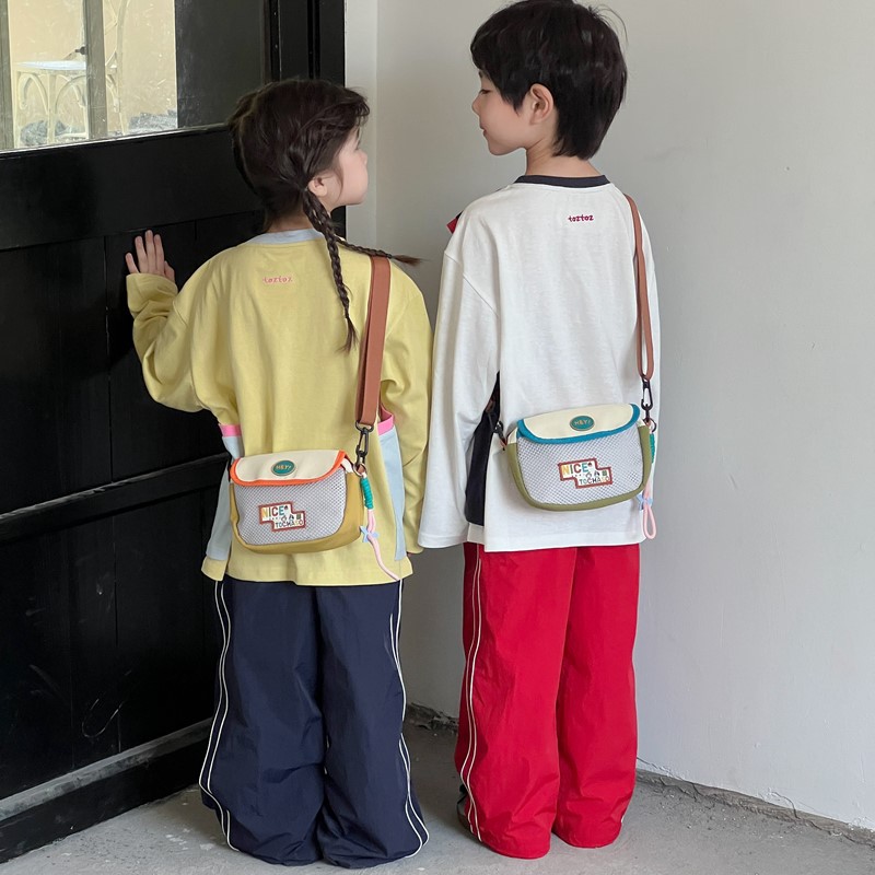 Moda coreana, bolsas de hombro para niños y niñas, exquisitas mini bolsas de cambio para bebés, bolsas de malla de comercio exterior nuevas para niños