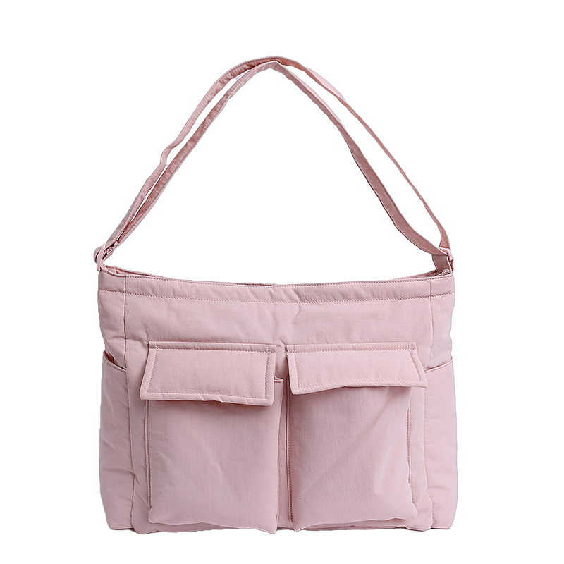 Bolsa de lona de explosión de comercio exterior para mujeres 2025 nuevo viaje multibolsillo bolso de gran capacidad para trabajar mochila de hombro