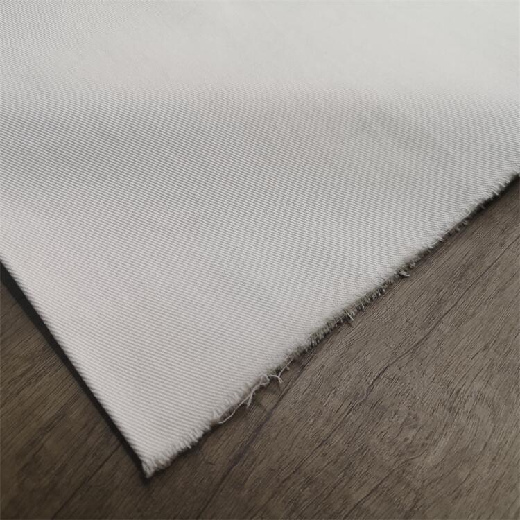 Fabricante al por mayor micro elástico tela de spandex de twill 250gsm pantalones blancos tela elástica de algodón de twill cómodo superficie de spandex