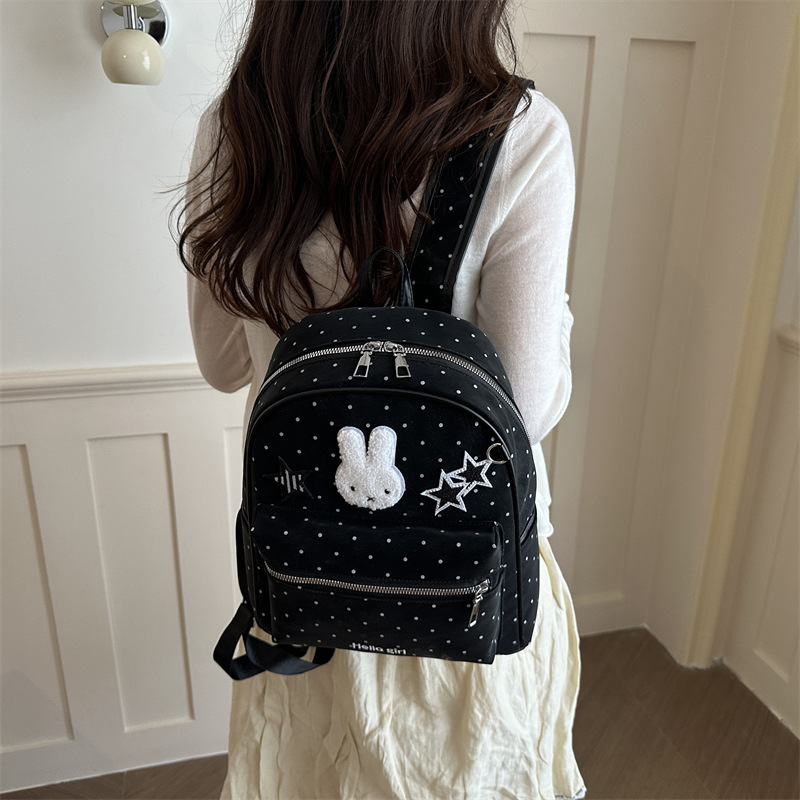 Mochila de estudiantes casuales coreana para mujeres 2026 nueva mochila de nicho de diseño de dibujos animados encantadora personalidad mochila