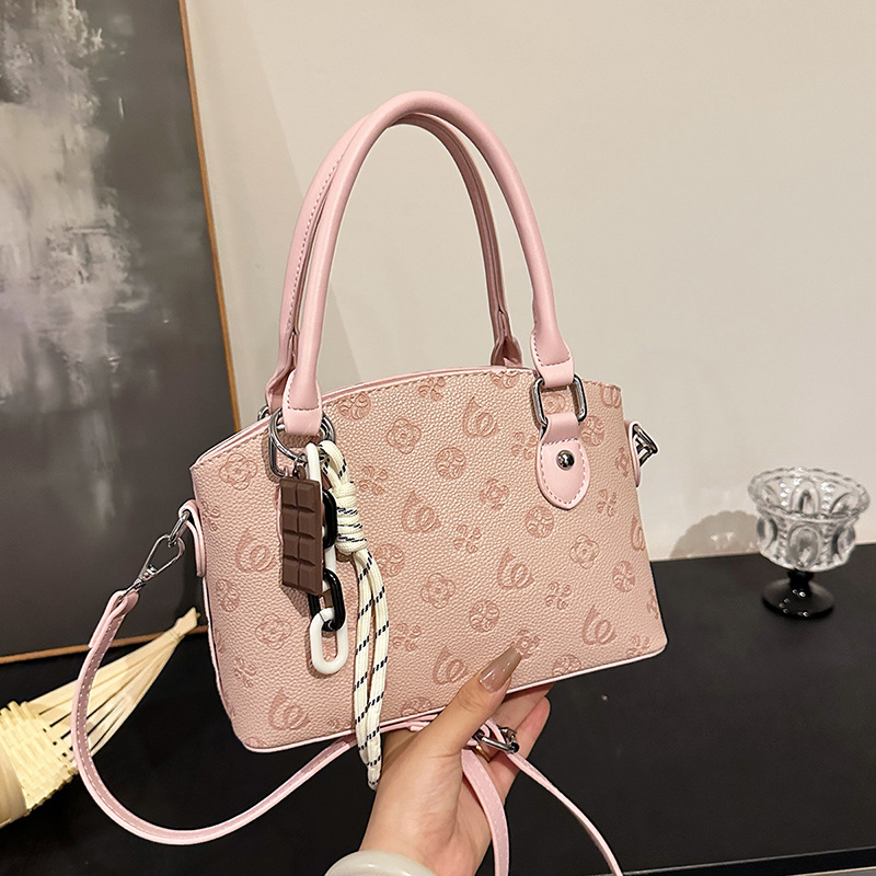 Bolso de textura transfronteriza 2025 verano nuevo estilo bolso de hombro con patrón de lichi bolso de mensajero en relieve de moda mujer