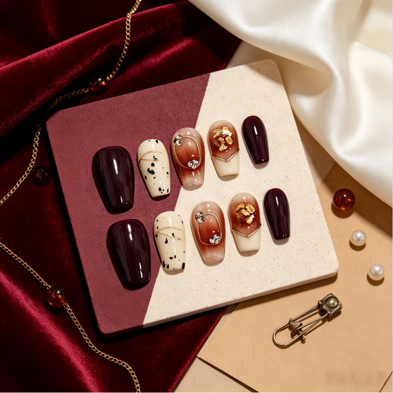 Gradient autumn red and gold French-style milky white manicure with a distressed, handcrafted look, versatile and flattering