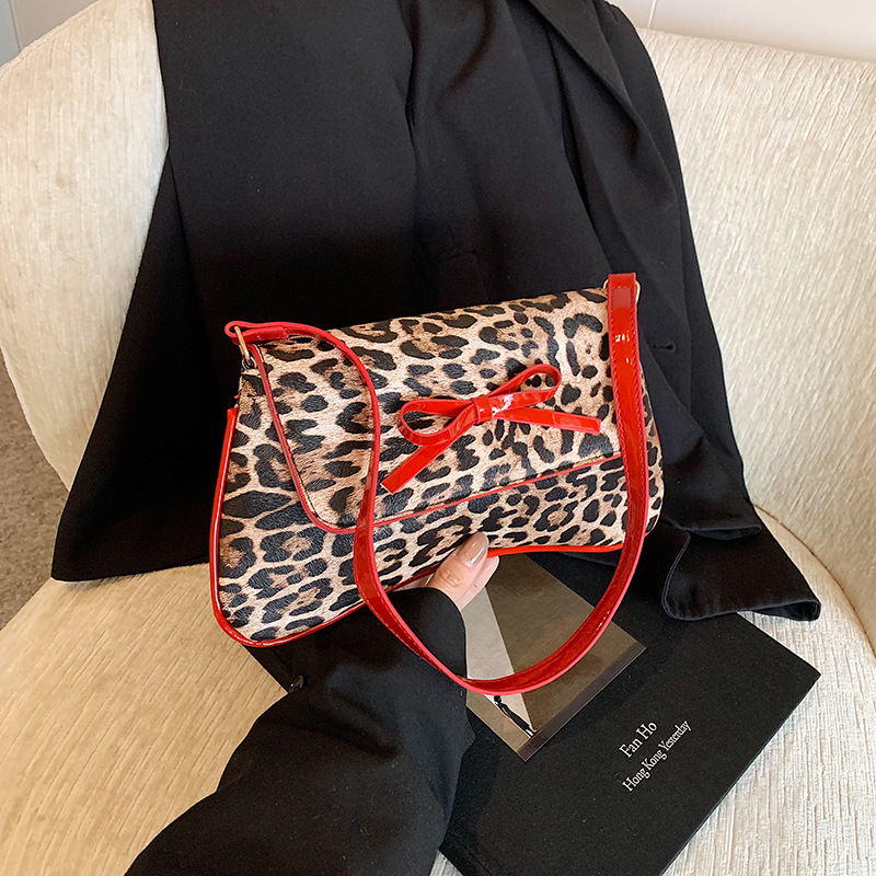 Bolso de leopardo nuevo estilo retro coreano arco de moda PU estilo exterior bolso de hombro axilar