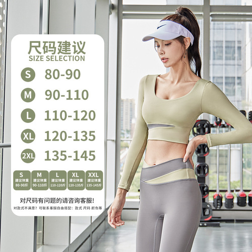 Peach color-blocked long-sleeved trousers suit, navel-baring color-blocked cross-over long-sleeved sports top, high-waisted contrasting color yoga pants