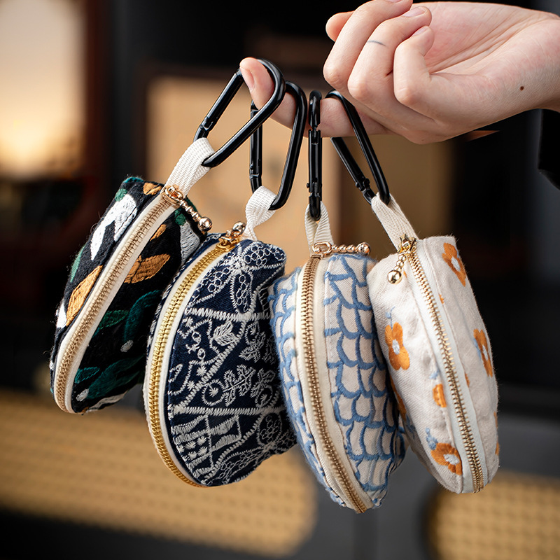 Directly from the manufacturer, cross-border heavy embroidery Japanese and Korean fabric multi-functional women's clutch bag key pouch