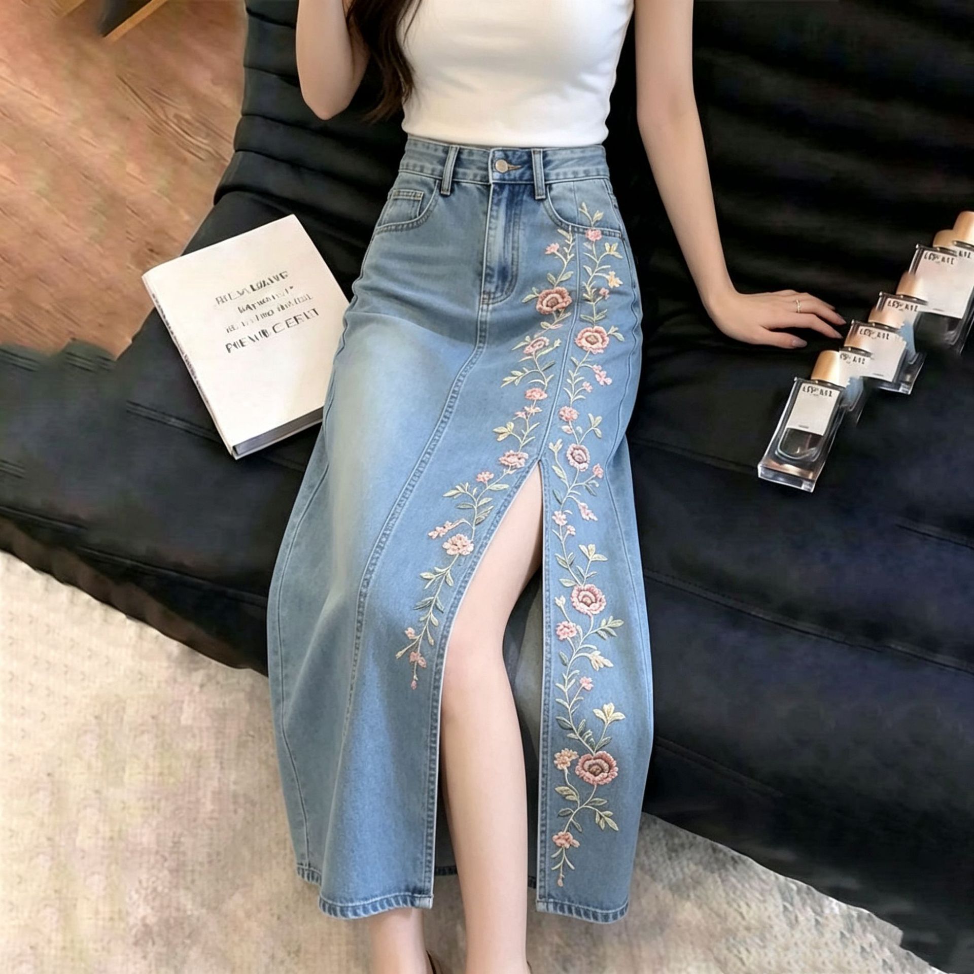 New Chinese style, sophisticated mid-length denim skirt with blue embroidery, high-waisted design, perfect for summer 2026.
