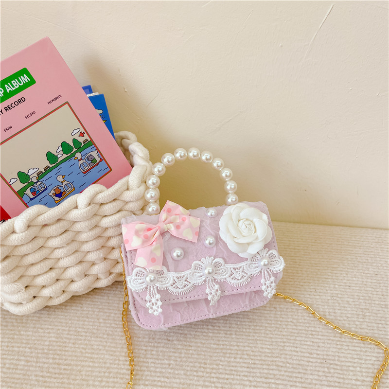 Bolsa para niños bolsa de mensajero de aire exterior 2022 nueva niña moda linda princesa bolsa de hombro pequeña fragancia bolso