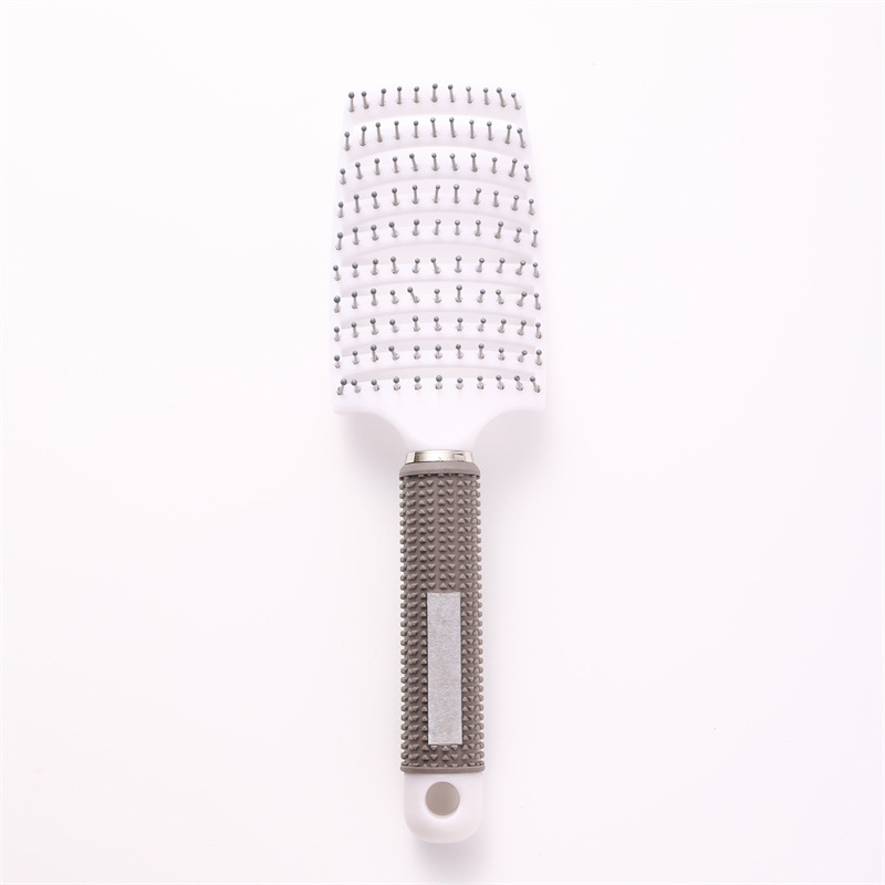 White monofilament [rubber-coated large curved comb]