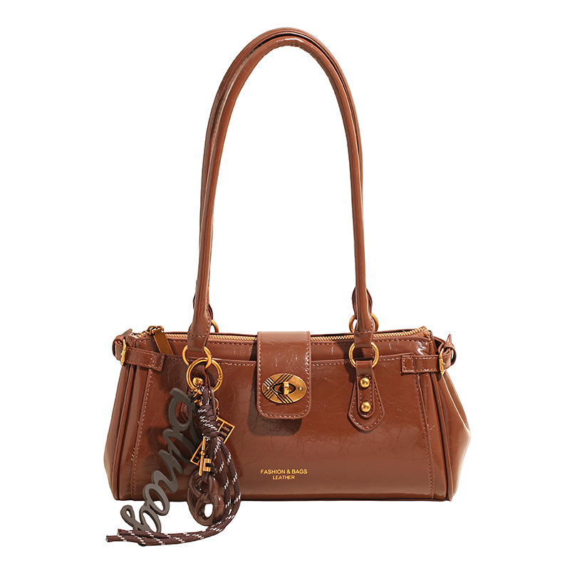 Bolsa de brazo de viaje coreano, bolso de cera retrógrada para mujeres, bolso de palo de piel de aceite 2025, nueva moda versátil bolso de hombro portátil