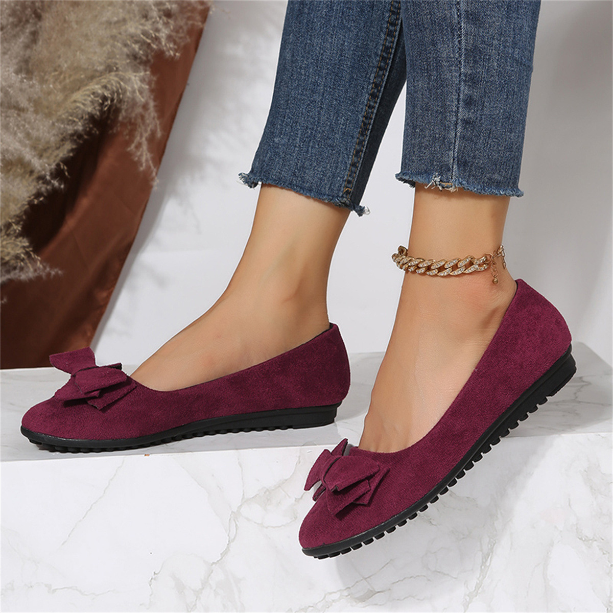 2025 primavera nuevo estilo comercio exterior gran tamaño plano casual zapatos individuales pies mujer gamuza lazo cabeza redonda zapatos de guisantes