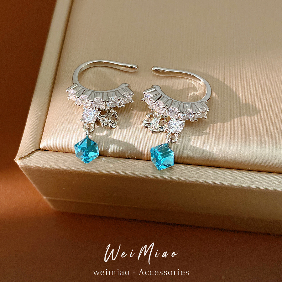 Zircon iris auriculares mujeres sin agujeros de orejas temperamento exquisito nicho pendientes de moda ligero lujo alta sensación auriculares al por mayor