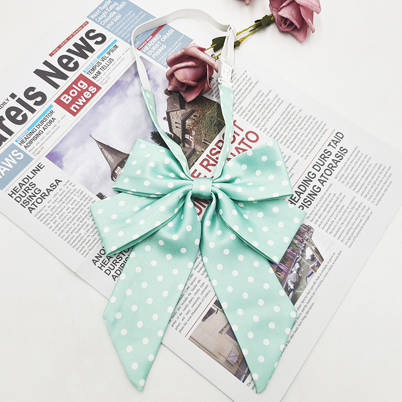 Punto al por mayor de doble capa oblicua pajarita de lunares moda nueva camisa estilo universitario uniforme enorme mango largo cuello JK flor