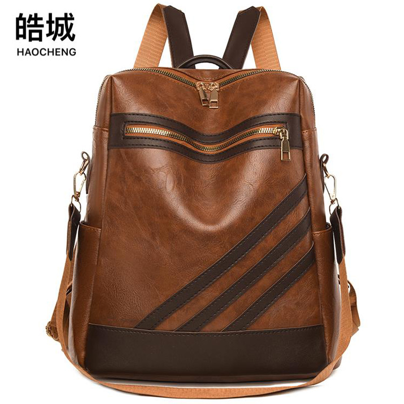 Mochila de cuero suave para mujer nueva transfronteriza Mochila multifuncional para mujer de rayas diagonales de moda Mochila escolar de doble uso de gran capacidad