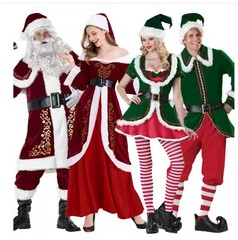 欧米のクリスマスの爆発のサンタクロースのカップルは緑の精霊の男女の祝日のパーティーの舞台のショーの服を詰めます。