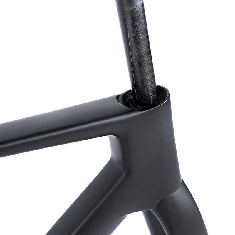 R18 carbon fiber frame road bike with thru-axle disc brakes, aerodynamic racing design, hidden internal cable routing, all black without logos