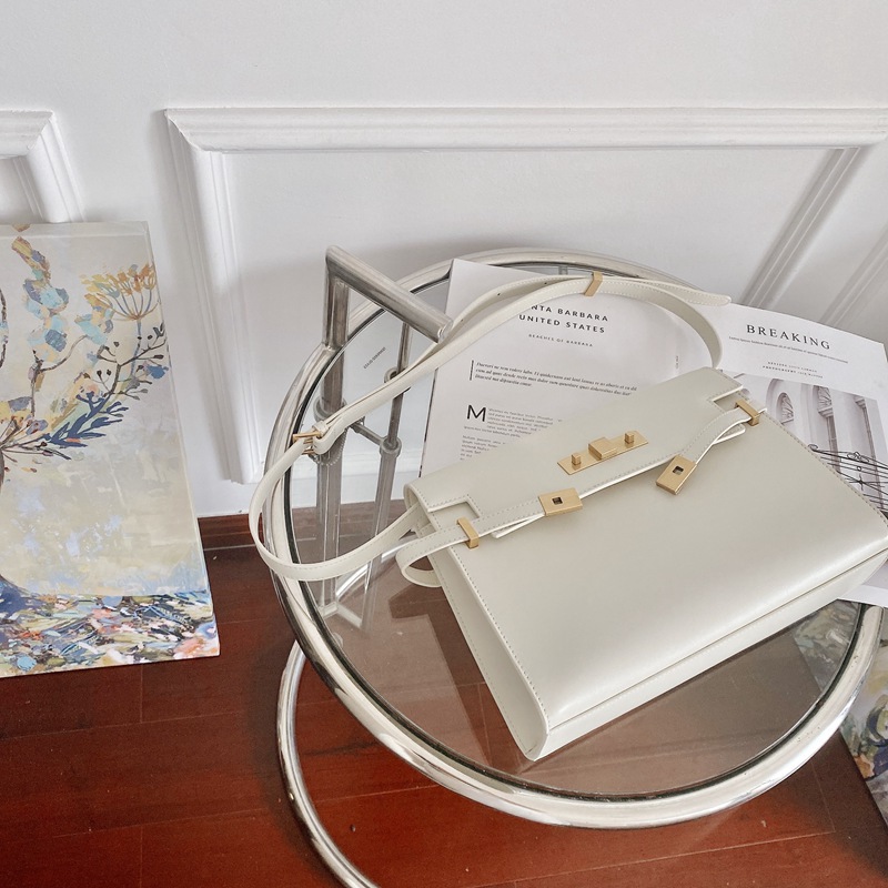 Yang Shulin Manhattan Kelly bolso de cuero 2025 nuevo bolso de mensajero portátil de cuero de alta gama de gran marca