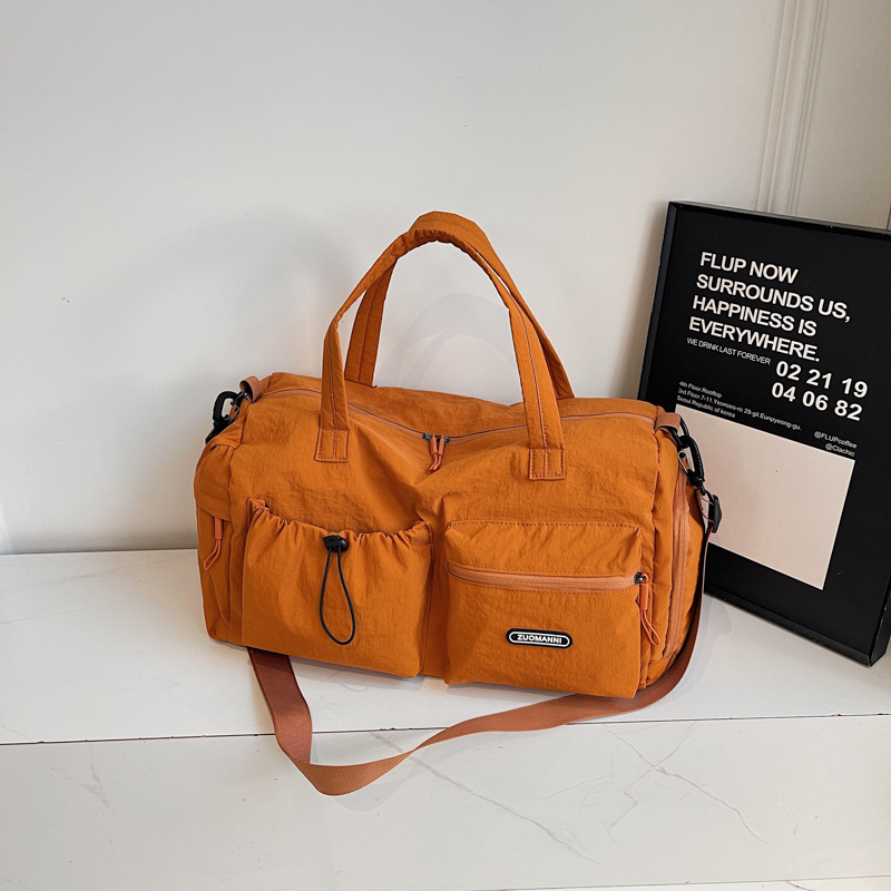 2025 nueva bolsa de viaje de gran capacidad para mujeres ligera separación seca y húmeda nadadora bolsa de equipaje de gimnasio portátil