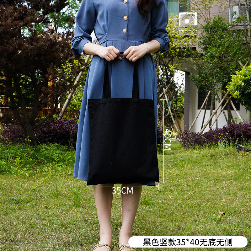 Bolsa de lona pequeña negra simple de las mujeres en stock bolsa de lona portátil en blanco Fábrica crossbody estudiante publicidad artística de un solo hombro