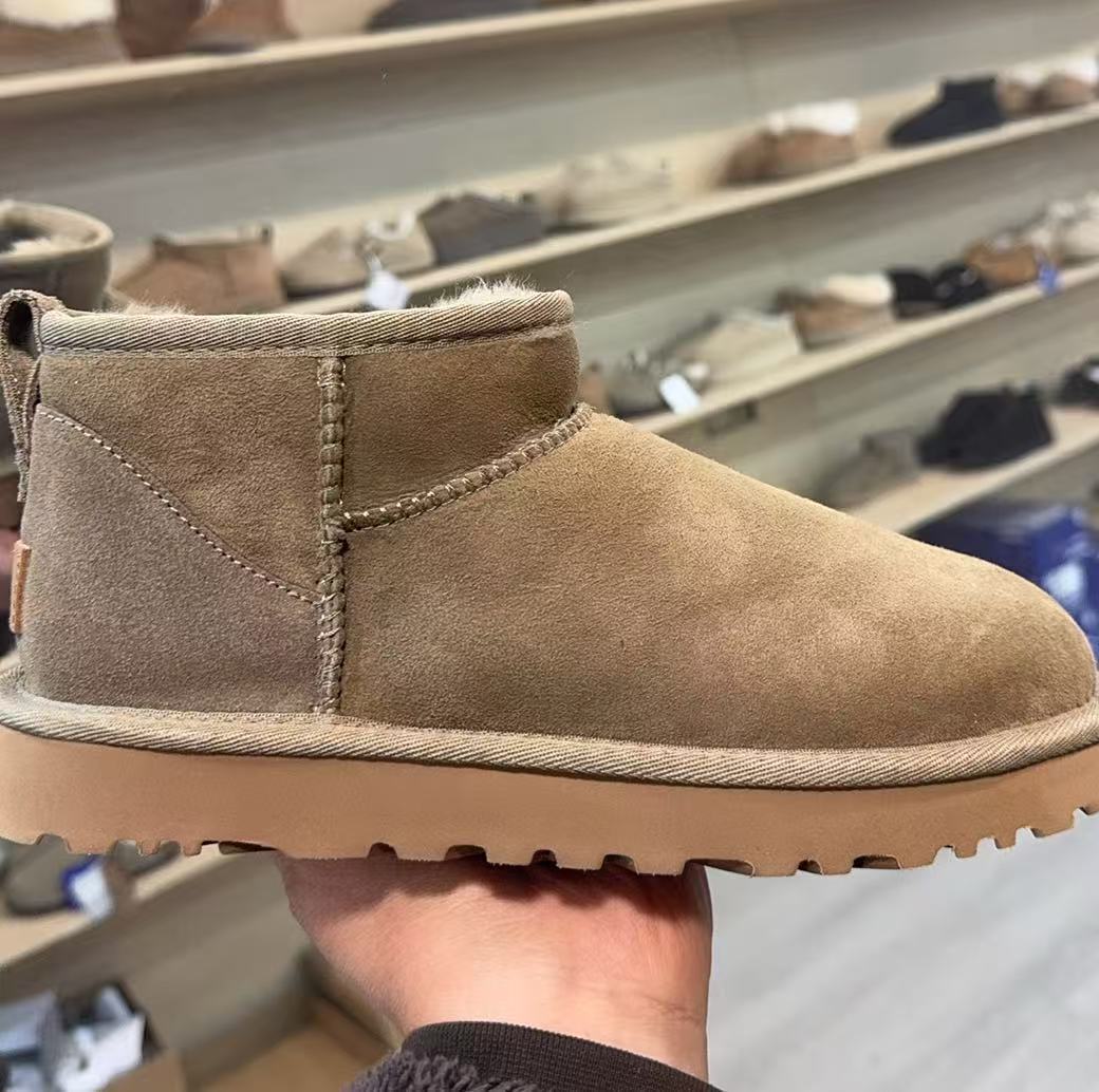 Sangpo botas de nieve de cabra de mujer un nuevo clásico de tubo largo con terciopelo grueso y calentamiento con zapatos de algodón