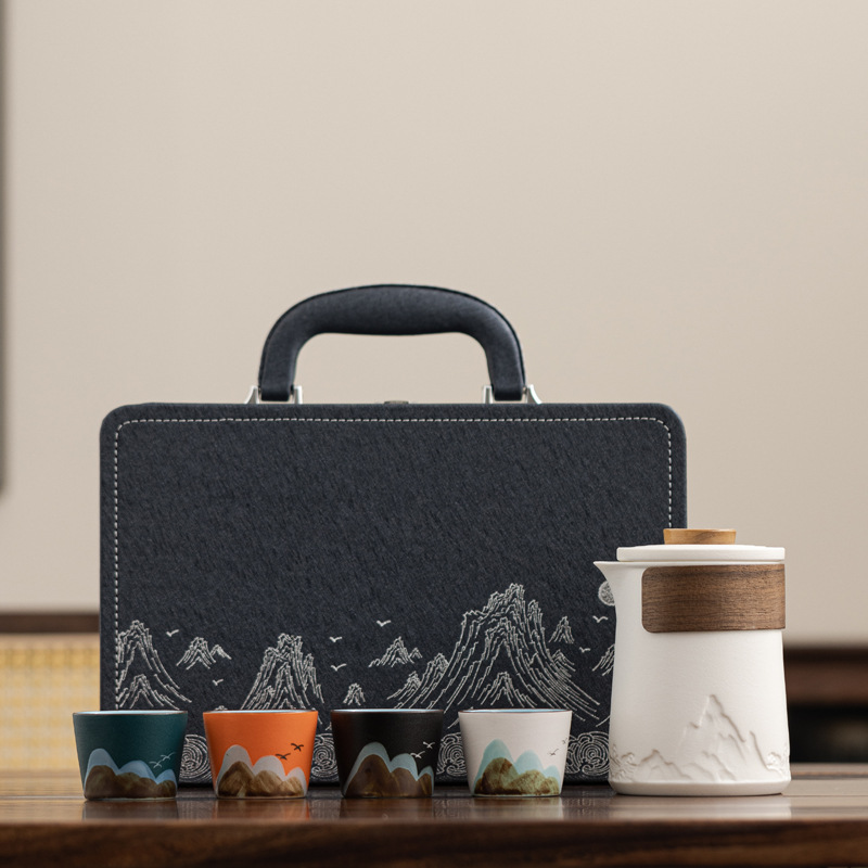 Conjunto de té de viaje de cerámica de estilo chino regalos de negocios de talla de taza de marca regalo de mano de empresa estatal bienestar