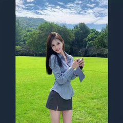 デザイン感のある大衆のユニークなストライプのつなぎ合わせのシャツの女性の秋のファッションブランドの国風の新しい中国式の長袖の上着