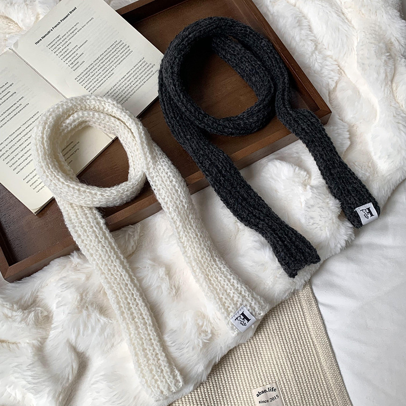 Otoño y invierno bufandas mujeres 2025 nuevo color sólido caliente de protección de cuello de lana de punto largo bufandas al por mayor
