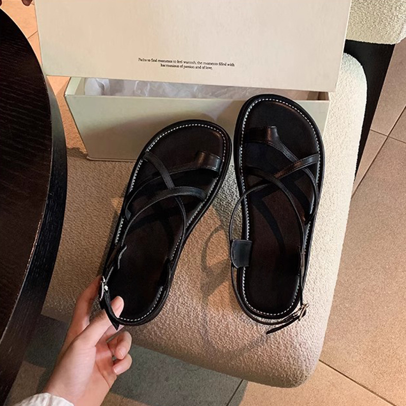 Madre de uva de verano nueva moda hebilla cruzada dedos de dedos nicho de estilo romano de vacaciones sandalias de suela gruesa para mujeres