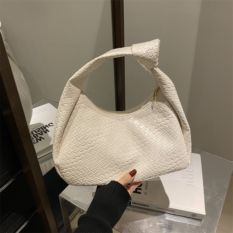 Casual retro de gran capacidad bolso de hombro de color sólido 2025 nuevo estilo de moda extranjera literatura y arte tejido brazaleta