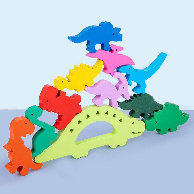 Bloques de construcción de equilibrio para niños dinosaurios apilados de alta inteligencia juegos de mesa de educación infantil padres-hijos interactivos juguetes de madera al por mayor
