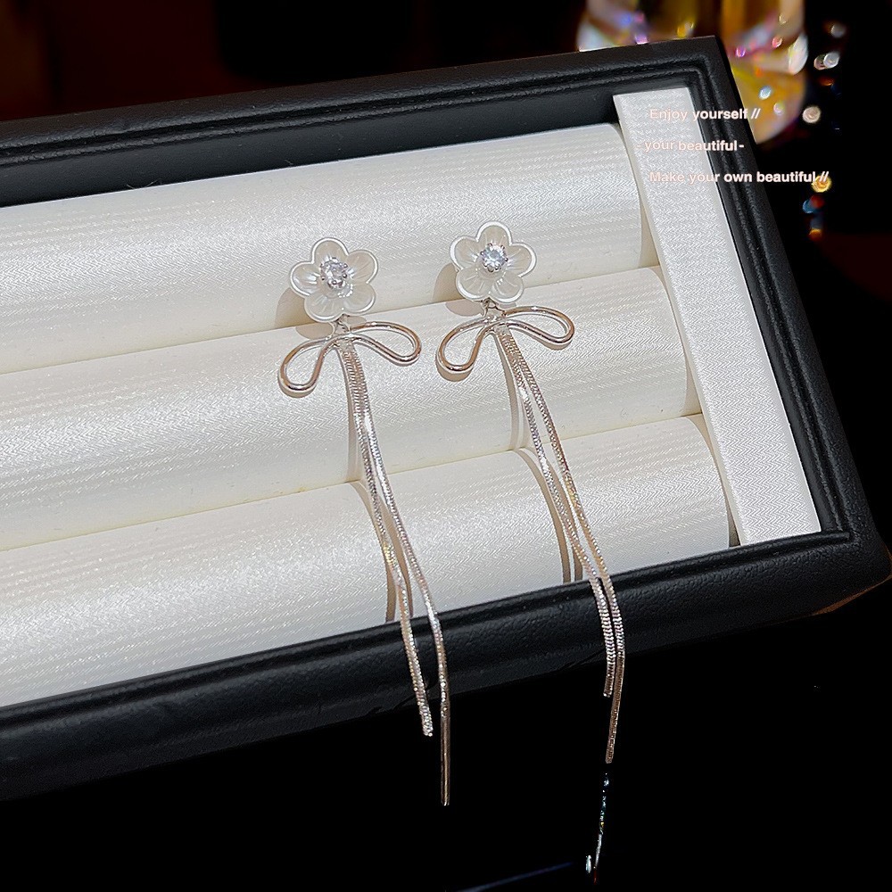 S925 aguja de plata elegante borla pendientes de alta gama simple cara de adelgazamiento pendientes de todo fósforo estilo coreano nuevos pendientes de moda al por mayor